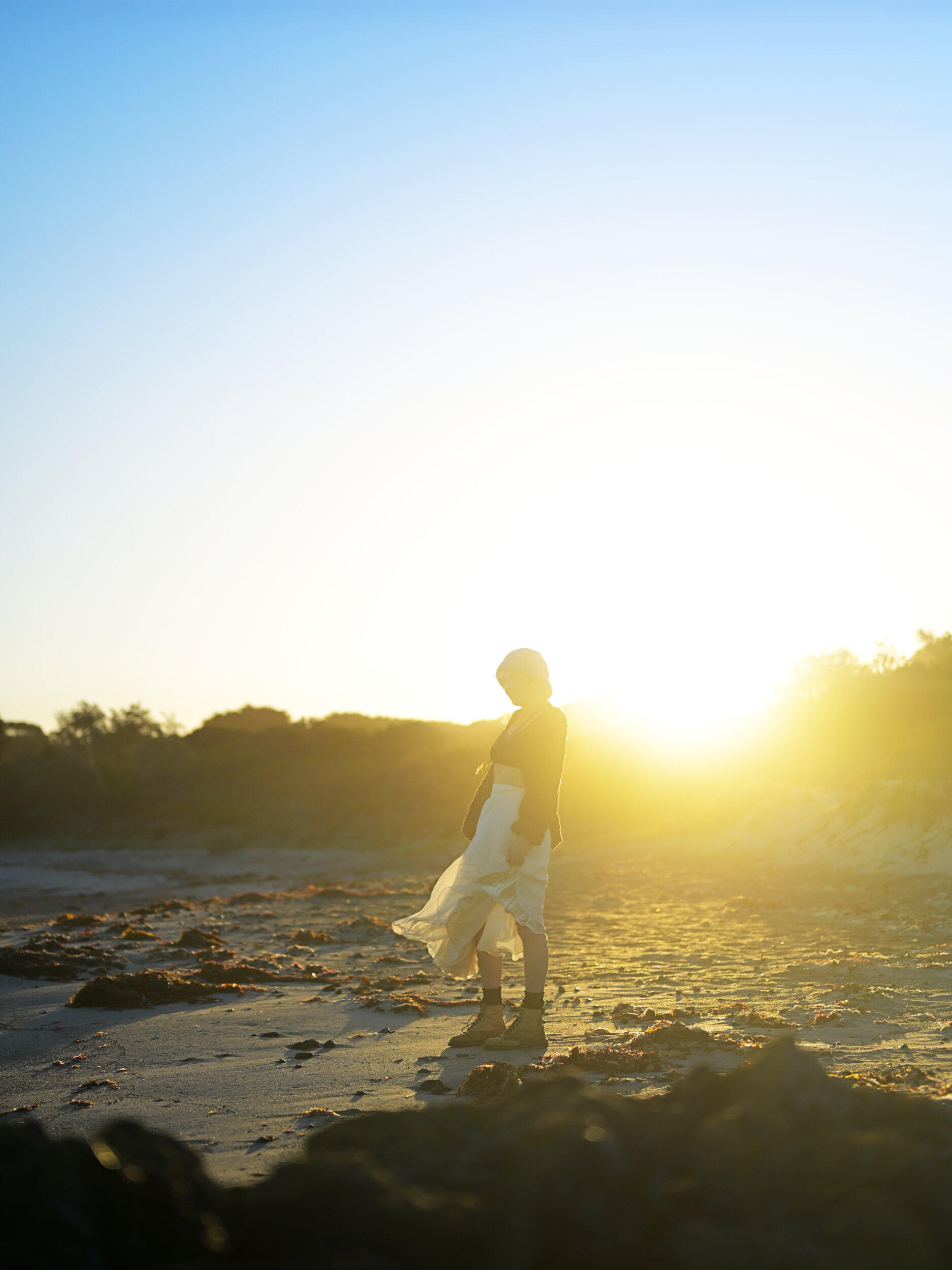 I love that sunset almost silhouetting her outline. This was shot at Bear Gully near Wilson Prom in Victoria.